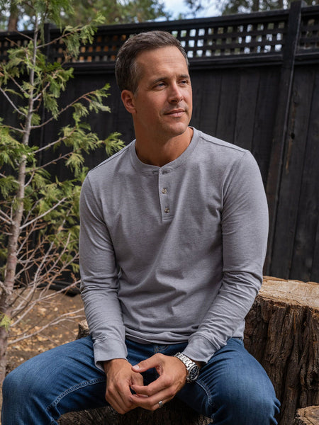 Ben is 6'1, 180lbs and wears a size M # Heather Grey Long Sleeve Henley | Fresh Clean Tees Canada
